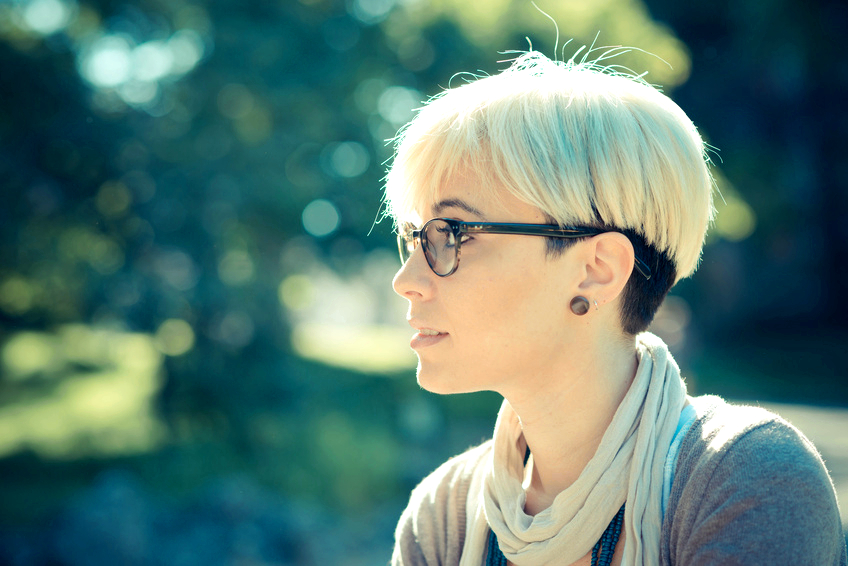 beautiful young blonde short hair hipster woman in the city